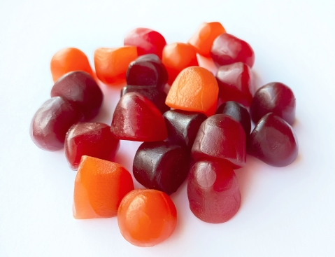 Burgundy and orange gummies
